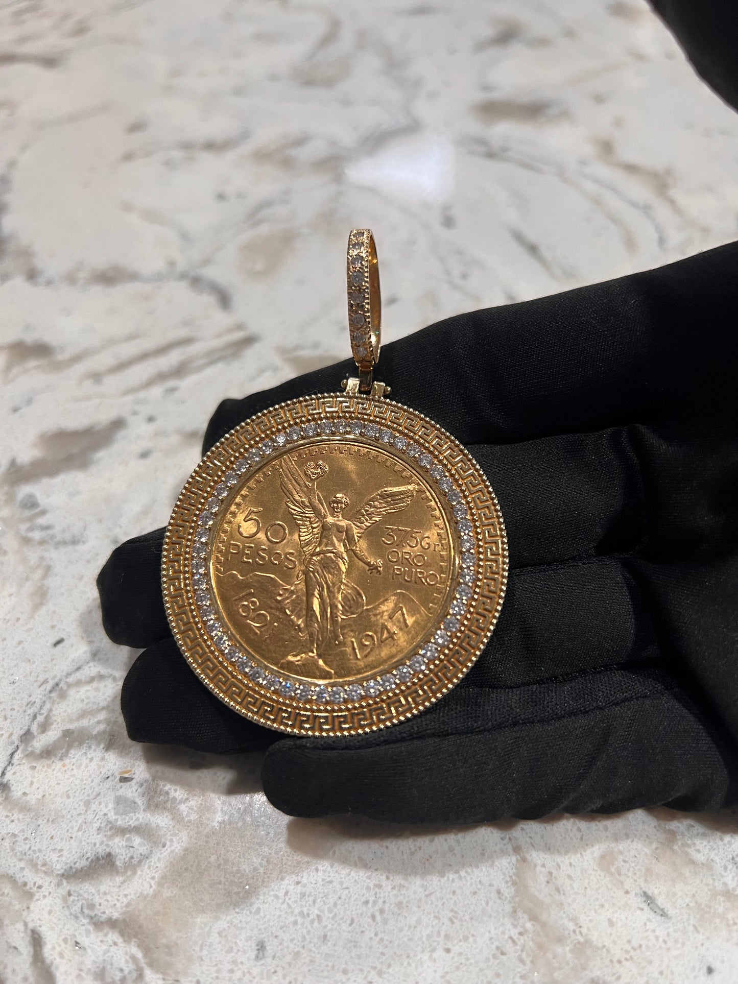 Authentic 22k centenario with bezel