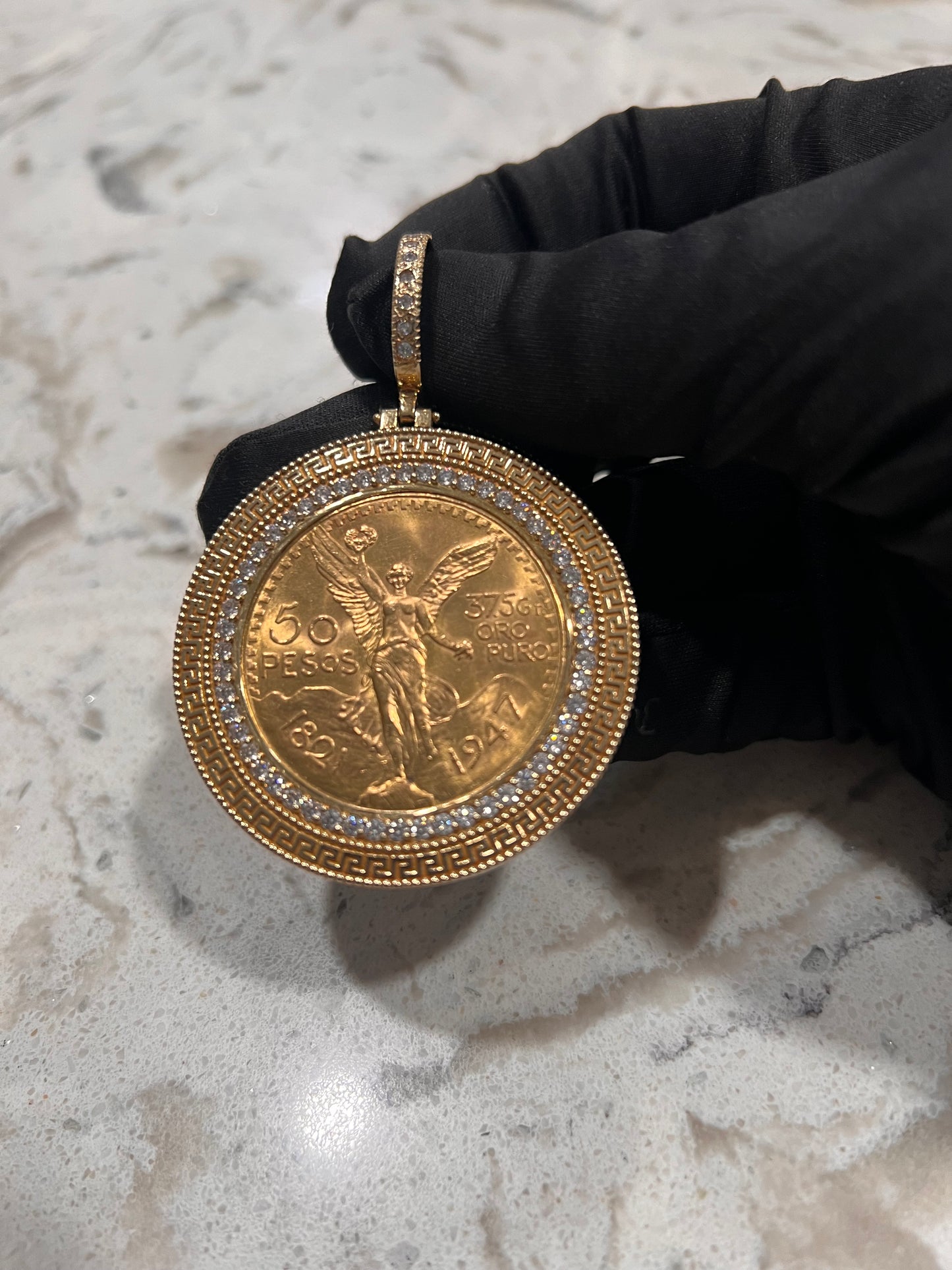 Authentic 22k centenario with bezel