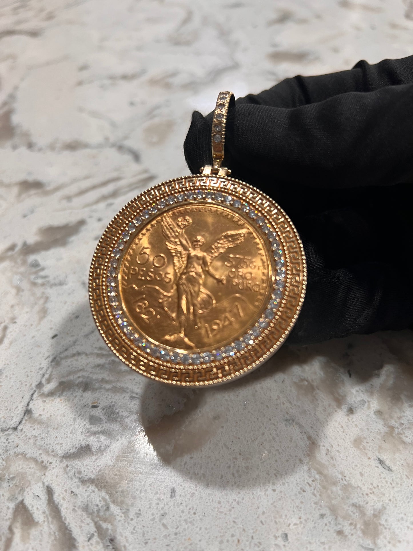 Authentic 22k centenario with bezel