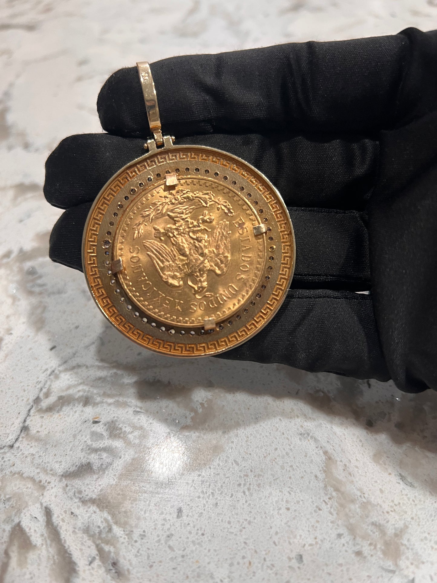 Authentic 22k centenario with bezel