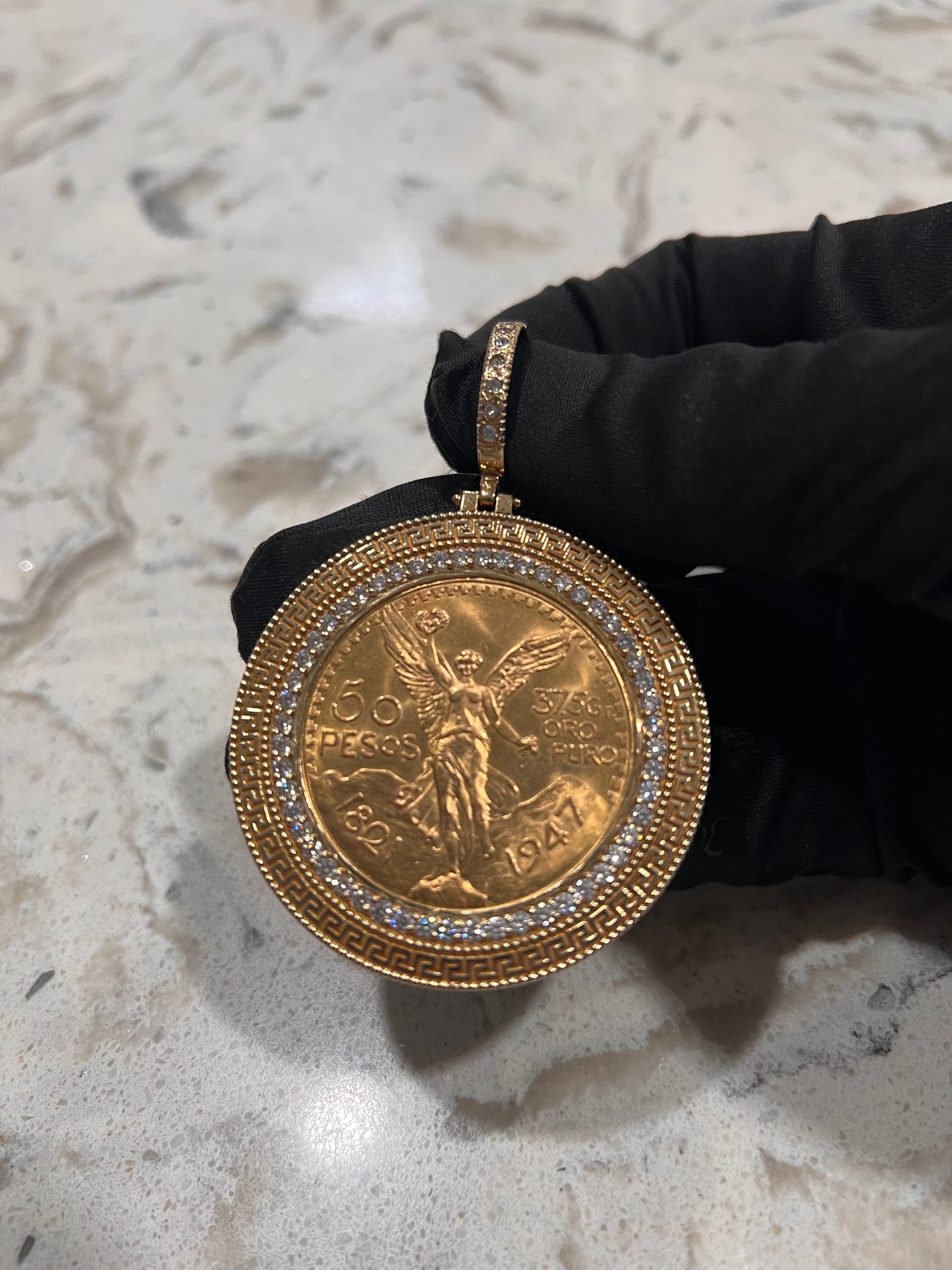 Authentic 22k centenario with bezel