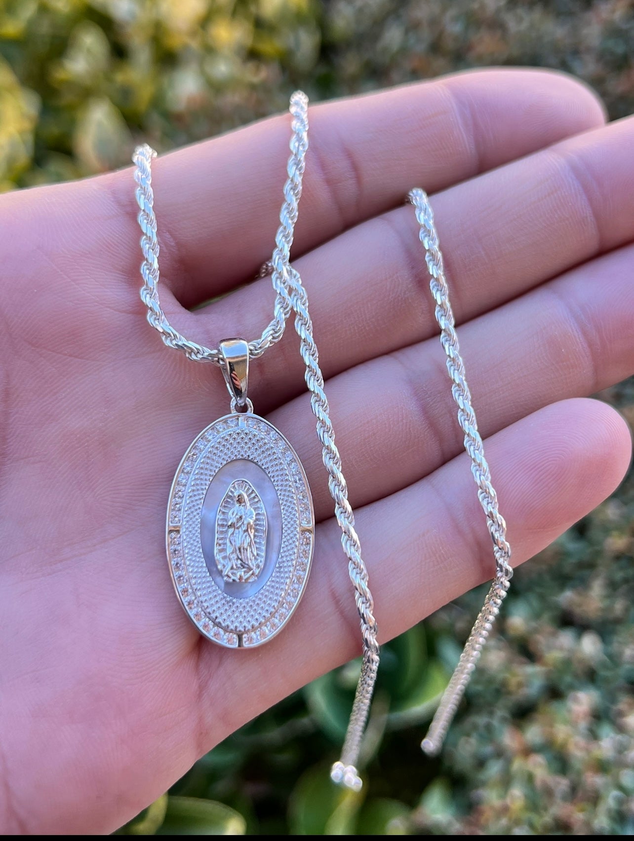 Oval Virgen Mary with Mother of Pearl In background .925 Real Silver