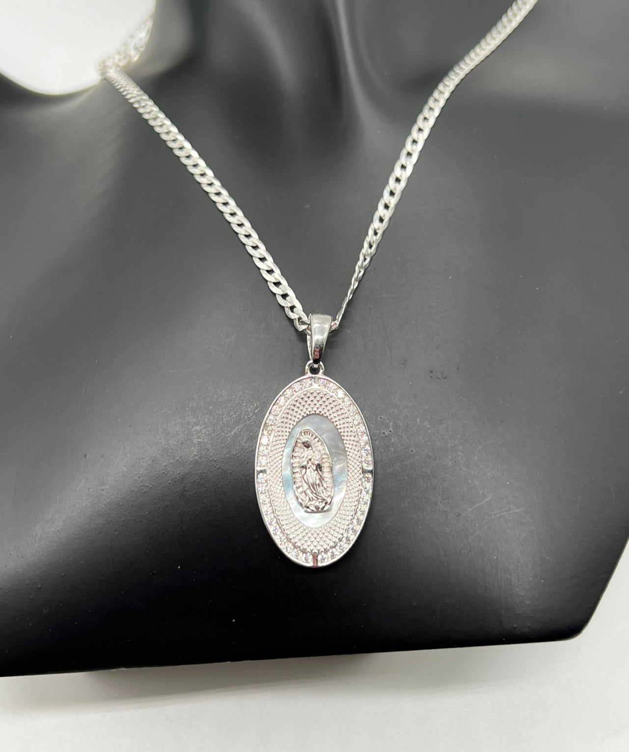 Oval Virgen Mary with Mother of Pearl In background .925 Real Silver