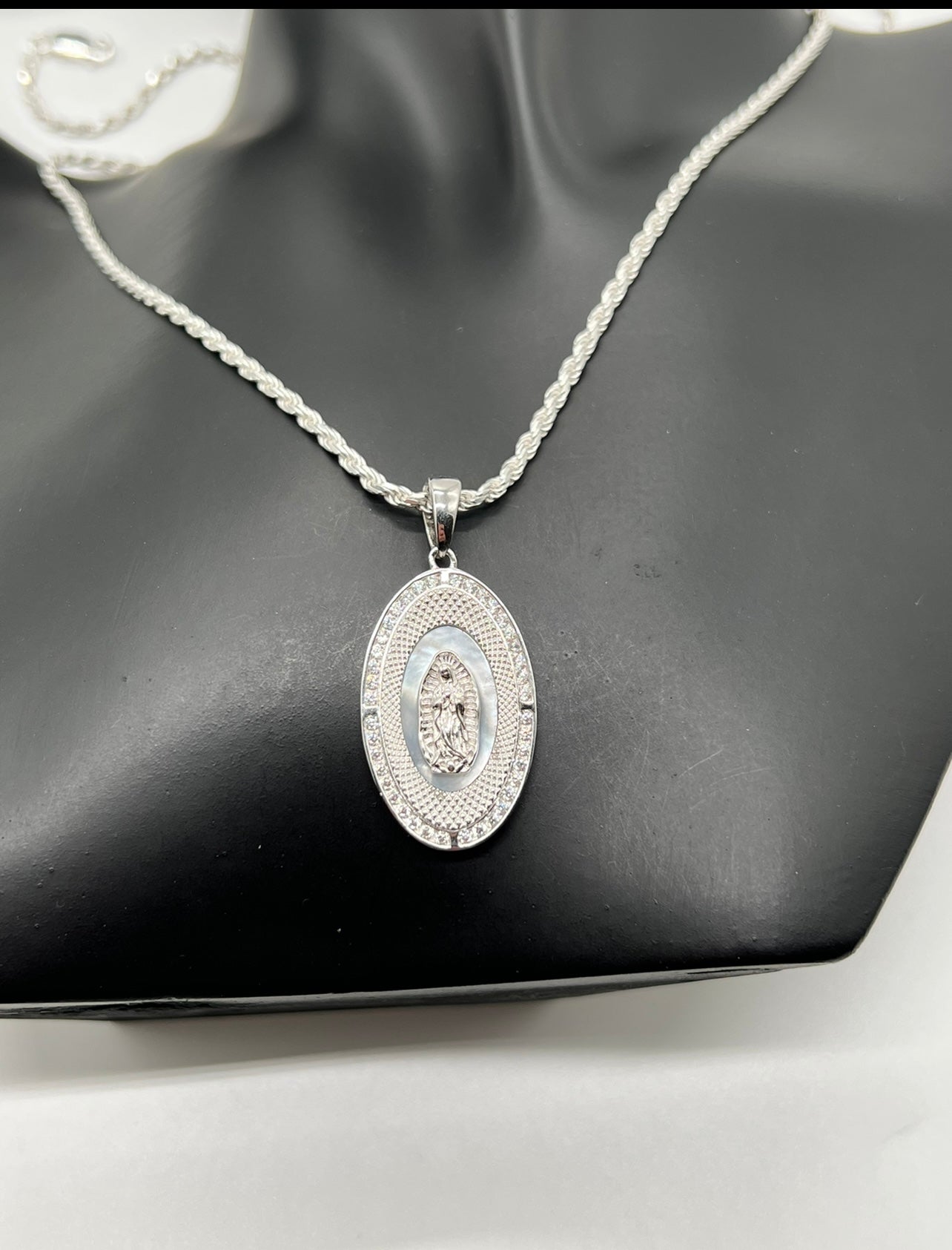 Oval Virgen Mary with Mother of Pearl In background .925 Real Silver